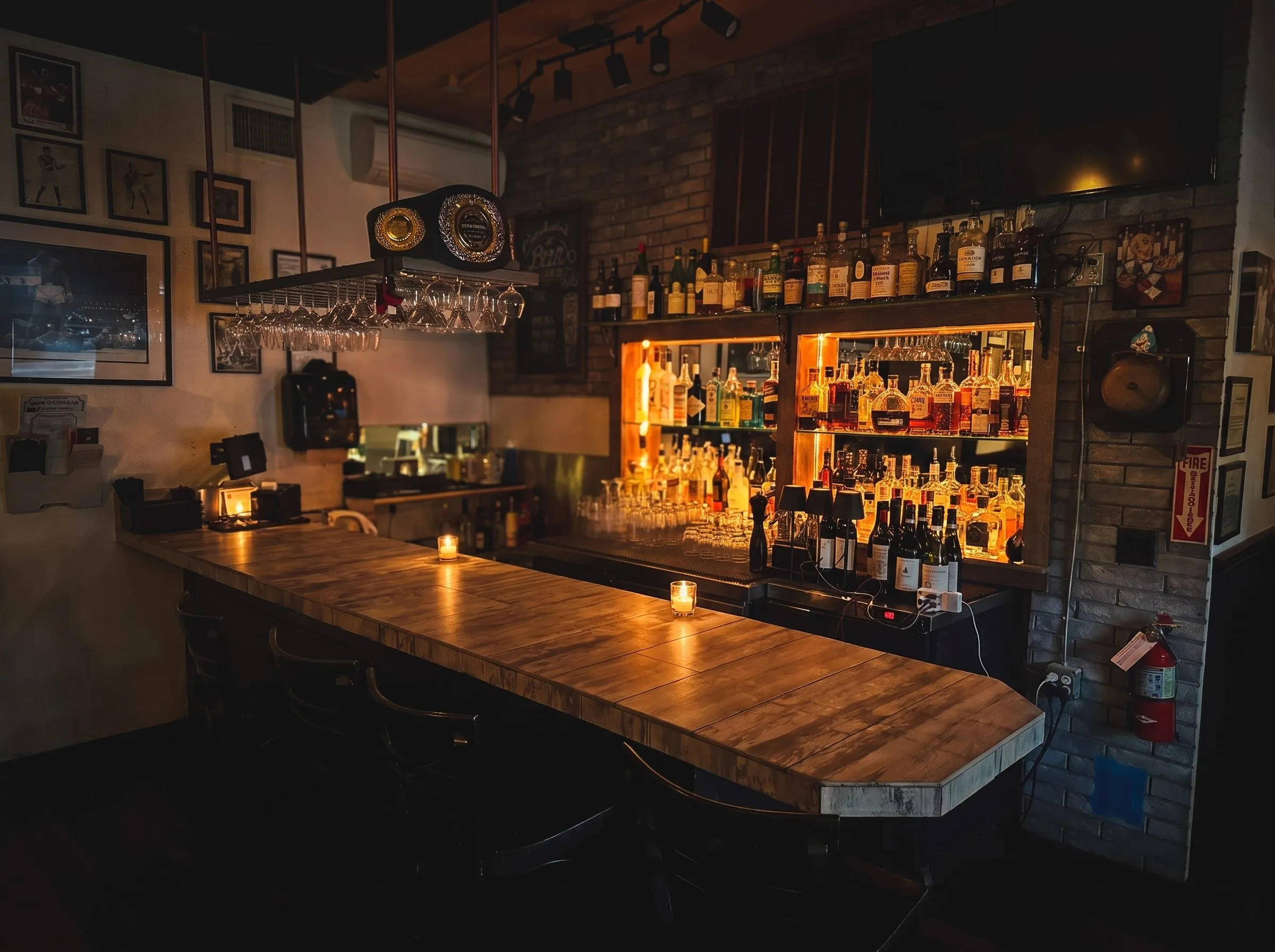 The full back bar glowing in the evening.